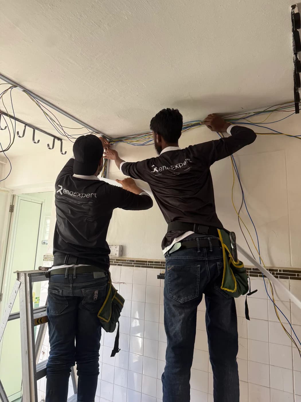 Electrical wiring work in progress during a home renovation